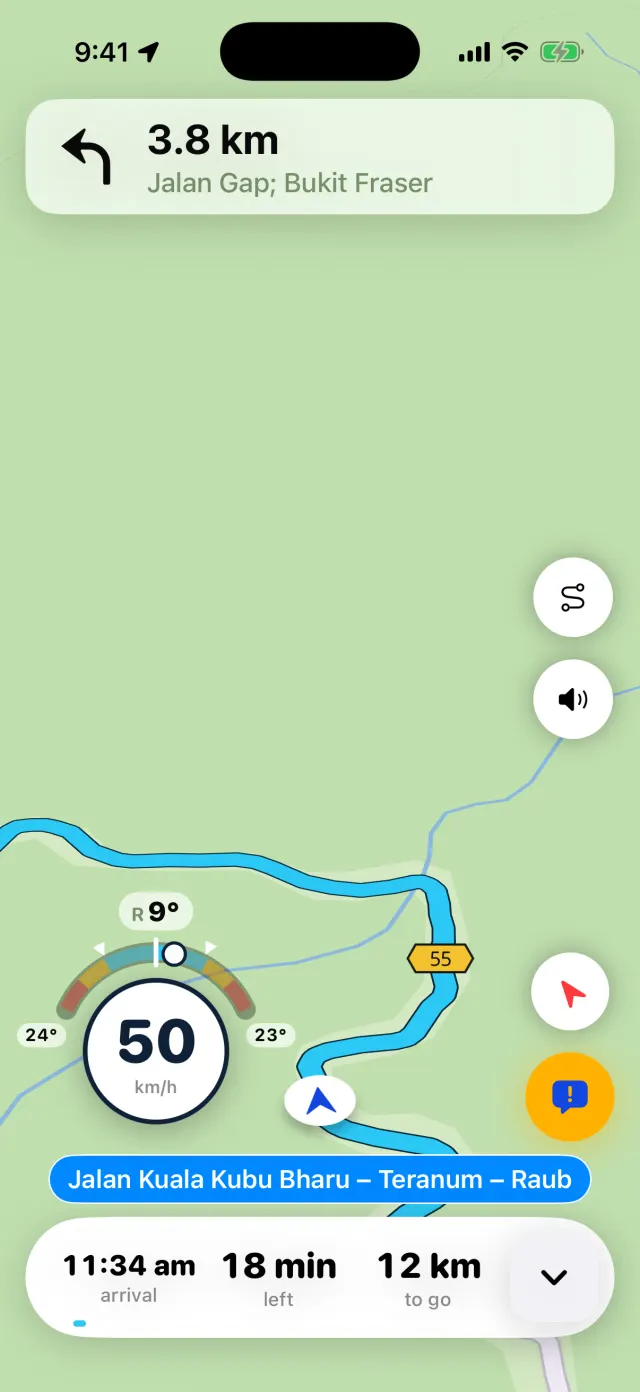 The riding screen in light mode: speed in a circle with a lean gauge above it, marked 24 degrees left and 23 degrees right.